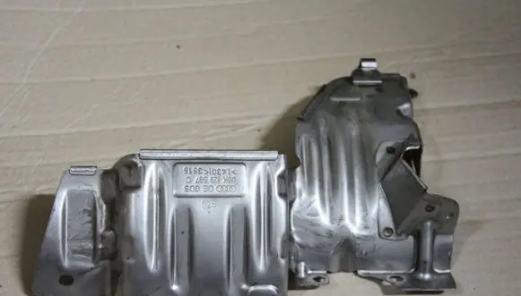 Volkswagen Golf VII Heat shield in engine bay 06K129597C