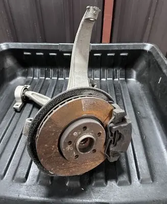 Front wheel hub spindle knuckle