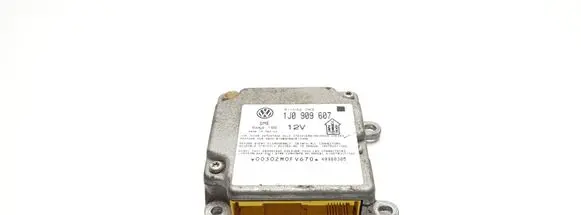 Volkswagen PASSAT B5 Airbag control unit/module 1J0909607