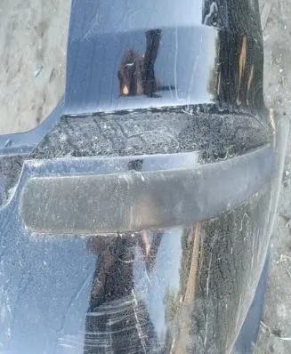 Rear bumper trim bar molding