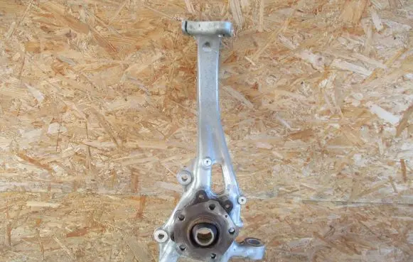 Audi Q7 4M Front wheel hub spindle knuckle 4M0407560