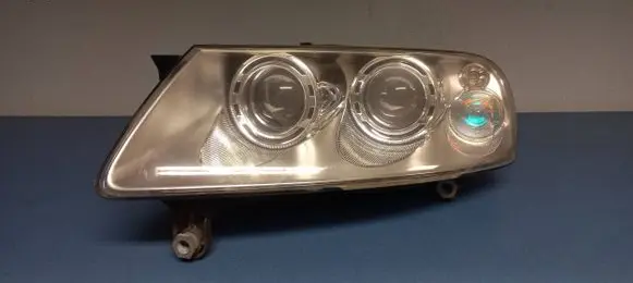 Volkswagen Touareg I Headlight/headlamp 7L6941015BB 89307851