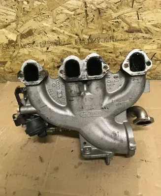 Volkswagen Golf V Intake manifold 03G129713 038131513AD