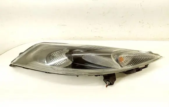Nissan Juke I F15 Headlight/headlamp