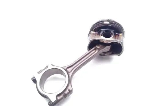 Piston with connecting rod