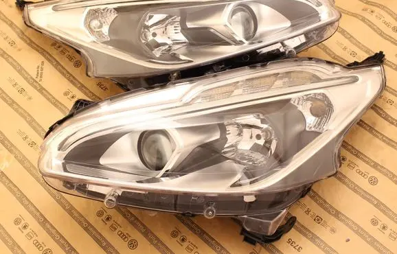 Peugeot 208 I Headlights/headlamps set 9822690180 9810805780