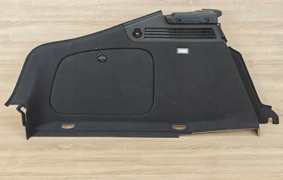 Trunk/boot side trim panel