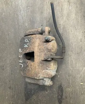 Jeep Grand Cherokee (WK) Front brake caliper