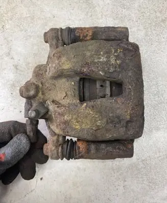 Opel Corsa D Front brake caliper