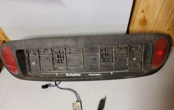 Renault Megane I Trunk door license plate light bar 22634004 7700842700