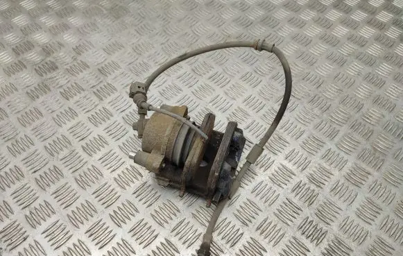 Volkswagen Golf VII Front brake caliper