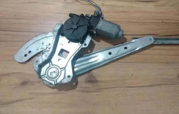 Sliding door window regulator with motor