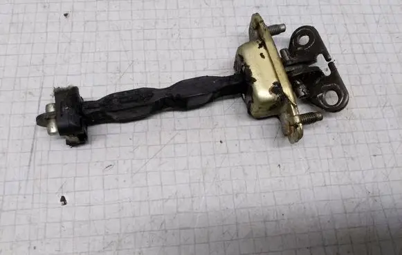 Toyota Corolla E110 Front door check strap stopper