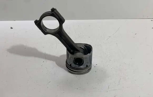 Piston with connecting rod