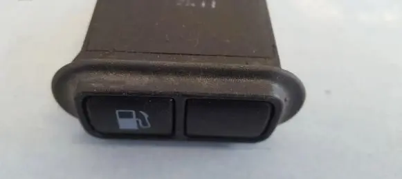 KIA Carnival Fuel tank opening switch 