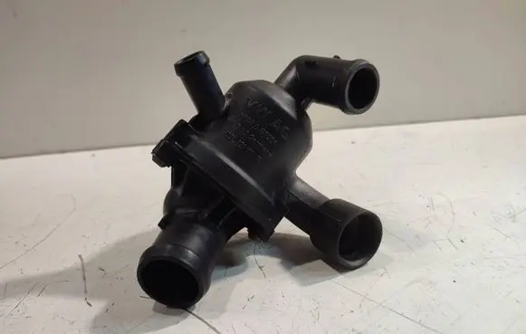 Thermostat/thermostat housing