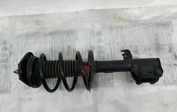 Toyota Avensis T250 Front shock absorber with coil spring 757230L L21524 TRW