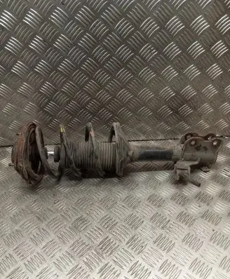 Nissan Almera Front shock absorber with coil spring