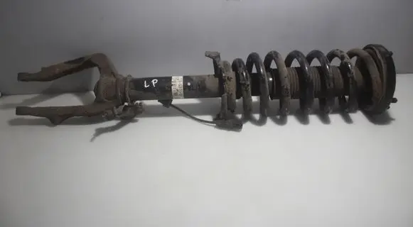 Front shock absorber with coil spring