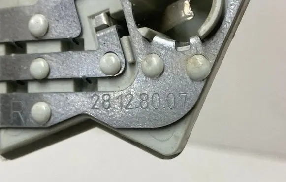 Volvo V50 Tail light bulb cover holder