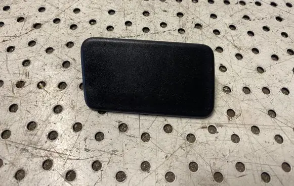 Headlight washer spray nozzle cap/cover