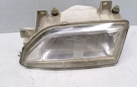 Ford Escort Headlight/headlamp 03791748 0245486