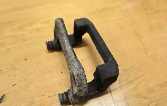Mazda CX-7 Brake caliper pad carrier rear 