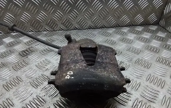 Volkswagen Golf IV Front brake caliper