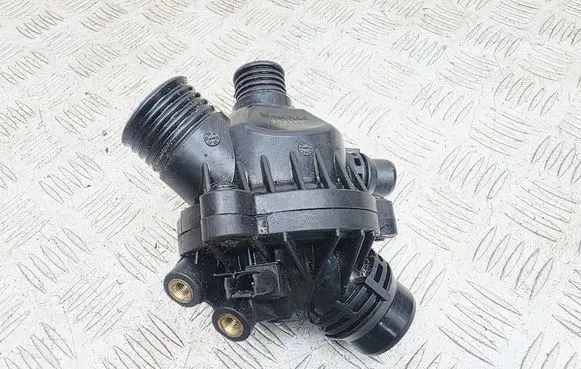 Thermostat/thermostat housing