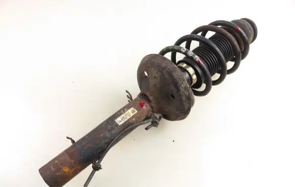 Volkswagen Golf IV Front shock absorber with coil spring