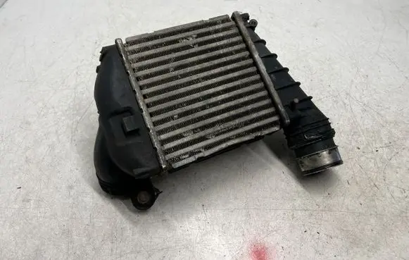 Volkswagen Golf IV Intercooler radiator 1J0145803N