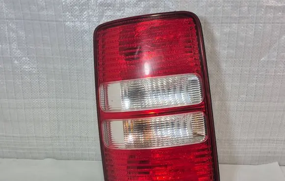 Volkswagen Caddy Rear/tail lights 2K0945111A