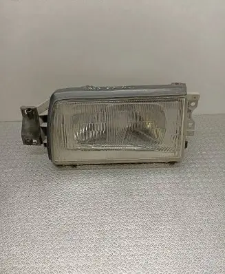 Mazda 323 Headlight/headlamp 11061191 11061194L