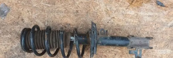 Opel Zafira B Front shock absorber with coil spring