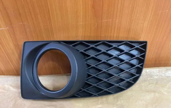 Mazda Premacy Front bumper lower grill C14650C21