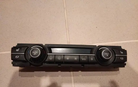BMW X5 E70 Climate control unit 9234335 21063338 900252420017