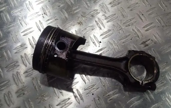 Piston with connecting rod