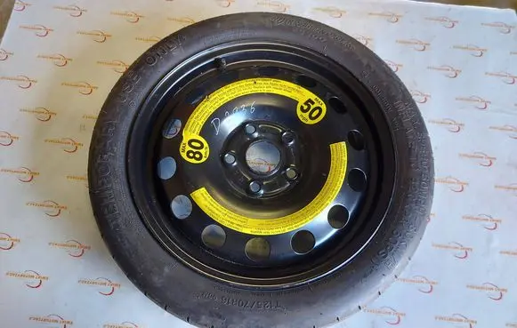 Volkswagen Golf V R16 spare wheel 1K0601027F