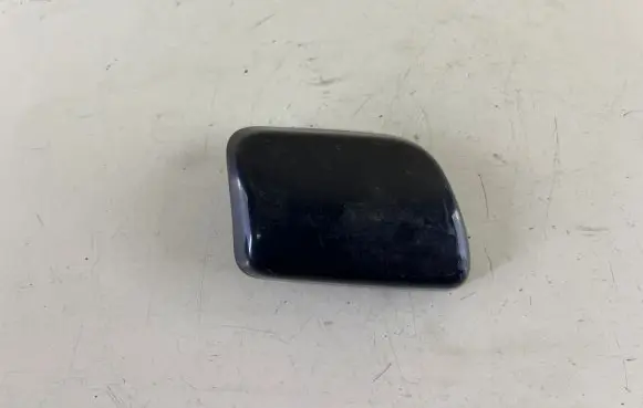 Headlight washer spray nozzle cap/cover