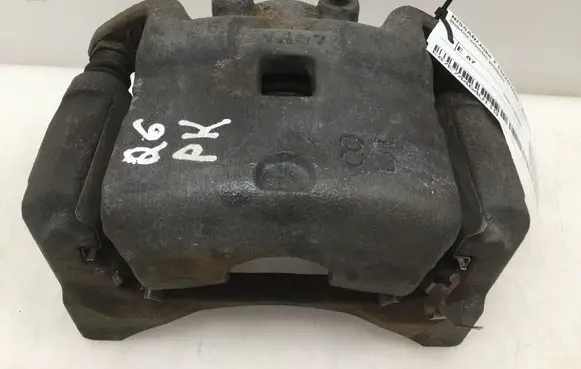 Nissan Juke I F15 Front brake caliper 