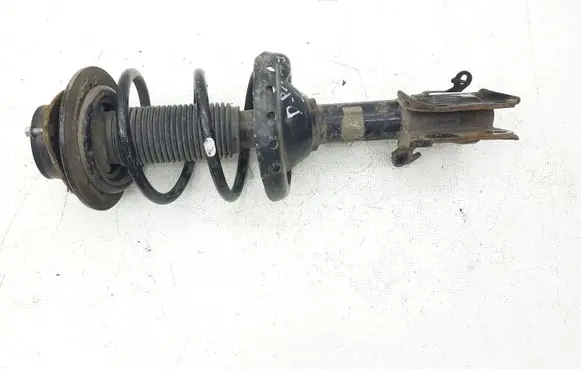 Subaru Legacy Front shock absorber with coil spring