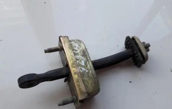Mazda 626 Rear door check strap stopper
