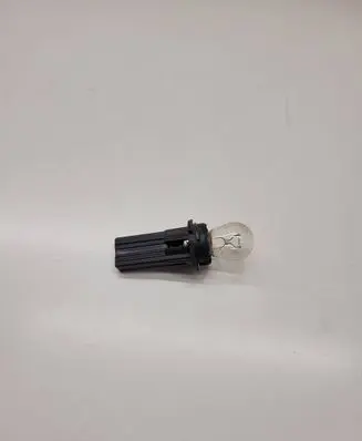 Tail light bulb cover holder