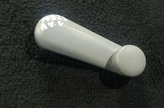 Mazda 323 F Rear door window winding handle 