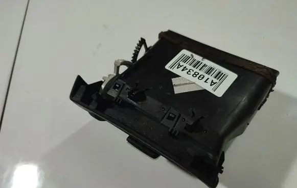 Dash center air vent grill