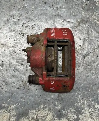 Mazda 323 F Front brake caliper