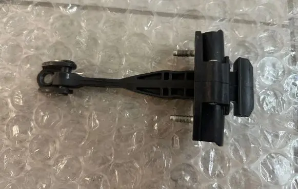 Volkswagen Amarok II Rear door check strap stopper