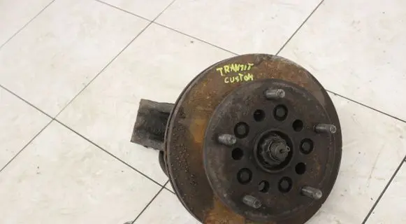 Front wheel hub spindle knuckle