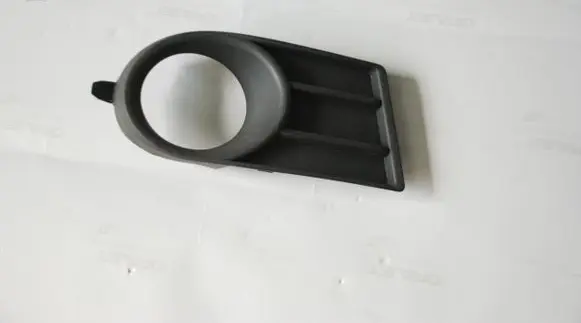 Suzuki Swift I Front fog light trim/grill 