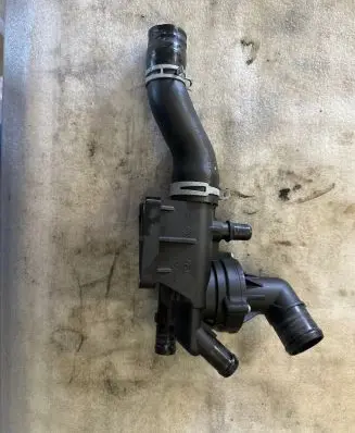Thermostat/thermostat housing